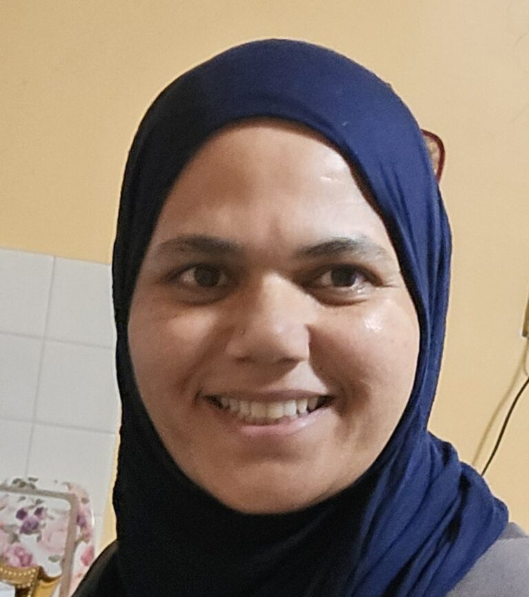 A Woman In A Blue Color Hijab