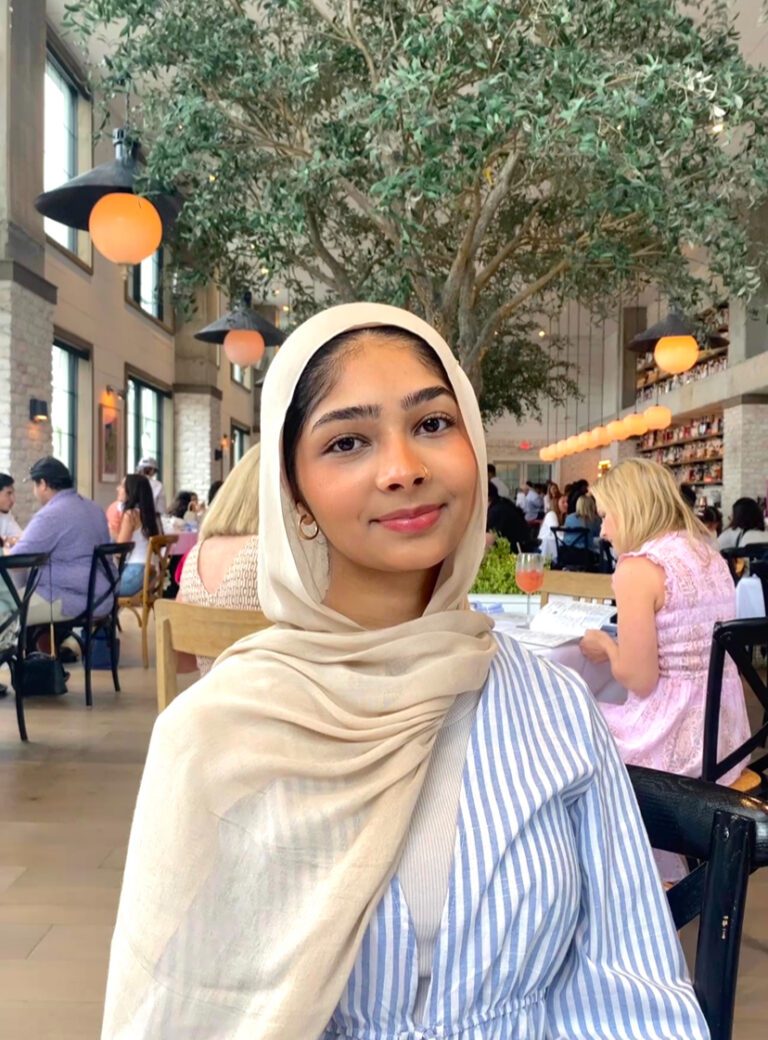Young woman in stylish indoor cafe.