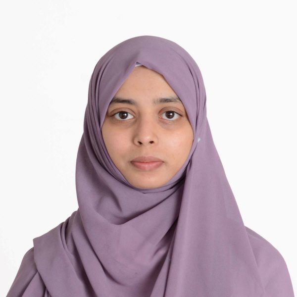 Young woman in a purple hijab.