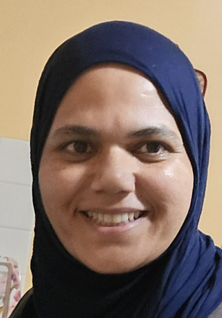 A Woman In A Blue Color Hijab